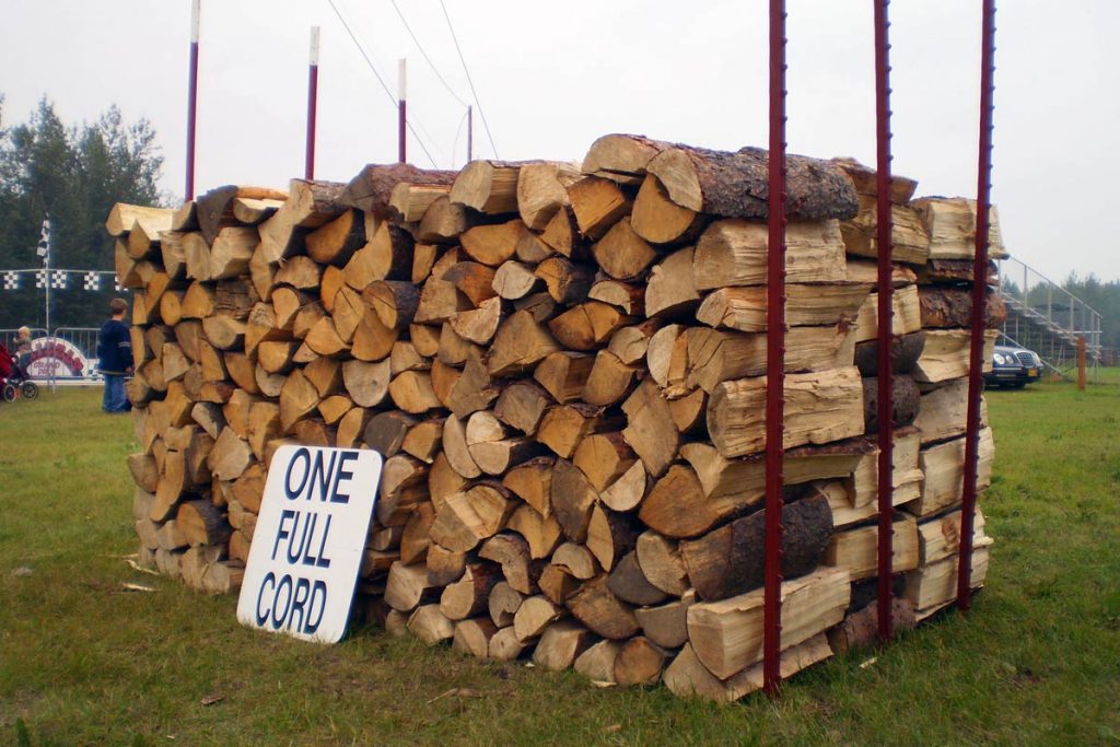 A full cord of firewood 4'x8'x4' cut into 3 16" ricks
